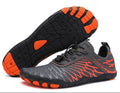 WEITE Schwarz-Orange — Barfußschuh mit breiter Zehenbox
